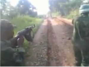 A screenshot of a video that went viral on social media networks, allegedly showing uniformed men shooting at unarmed villagers in the Kasai region of Democratic Republic of Congo, in mid-February 2017